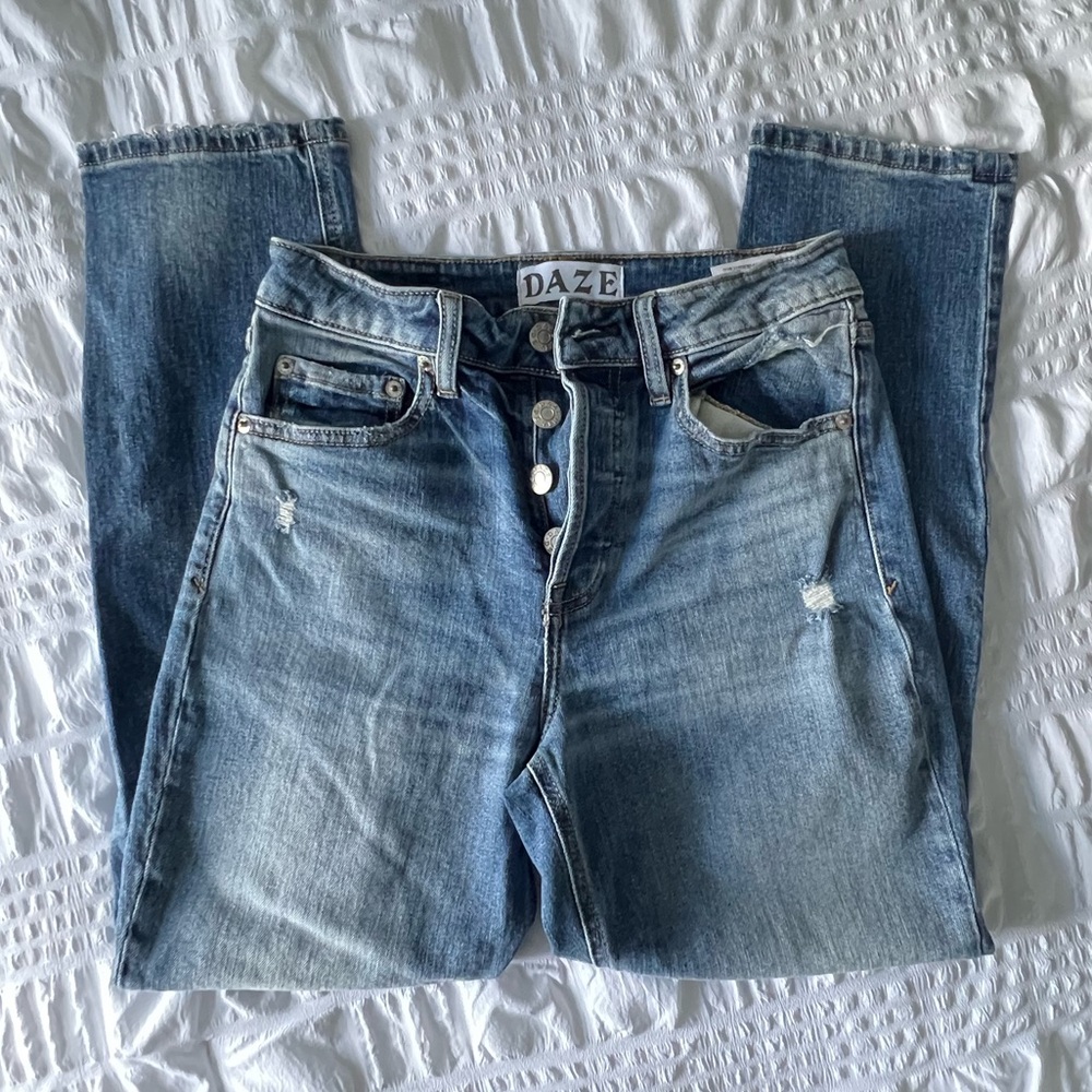 Daze ripped knee jeans